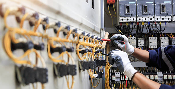 Professional Electrician technician working in Dock Junction, GA